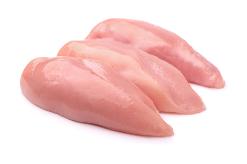 Raw chicken fillets isolated on white